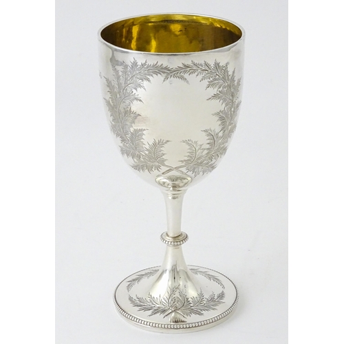 419 - A Victorian silver goblet with engraved fern detail and gilded interior, hallmarked London 1870, mak... 