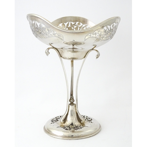 518 - A silver table centrepiece bowl of pedestal form with pierced floral and foliate decoration hallmark... 