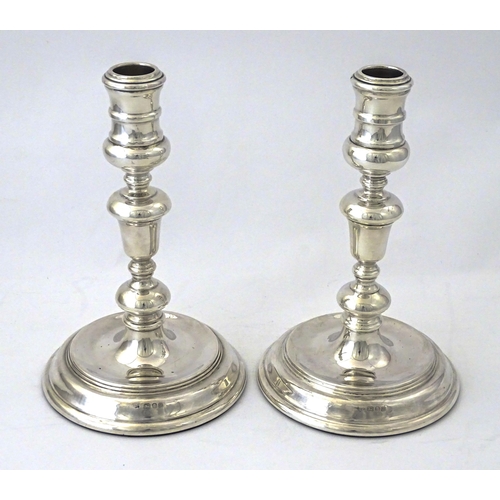 524 - A pair of silver candlesticks hallmarked London 1978, maker John Henry Odell. Approx. 7 1/4