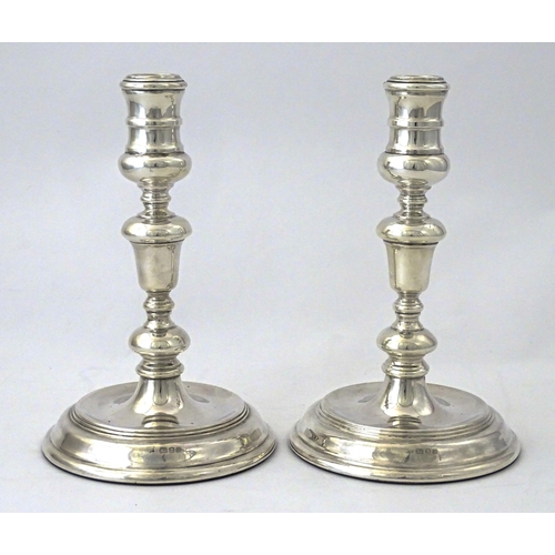 524 - A pair of silver candlesticks hallmarked London 1978, maker John Henry Odell. Approx. 7 1/4