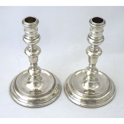 524 - A pair of silver candlesticks hallmarked London 1978, maker John Henry Odell. Approx. 7 1/4