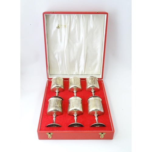 525 - A cased set of six Queen Elizabeth II silver goblets with gilded interiors and textured stems, hallm... 