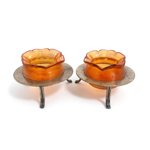 211 - A pair of glass posy holders with match striker bodies, with silver plate stands of circular form. A... 