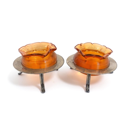 211 - A pair of glass posy holders with match striker bodies, with silver plate stands of circular form. A... 