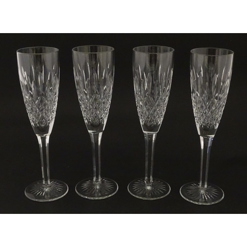 227 - A set of 8 Stuart crystal champagne flutes. Approx. 8 1/4