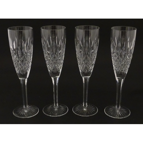 227 - A set of 8 Stuart crystal champagne flutes. Approx. 8 1/4