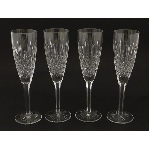 227 - A set of 8 Stuart crystal champagne flutes. Approx. 8 1/4