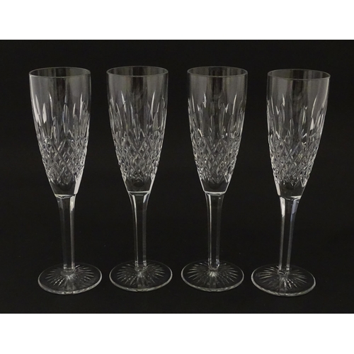 227 - A set of 8 Stuart crystal champagne flutes. Approx. 8 1/4