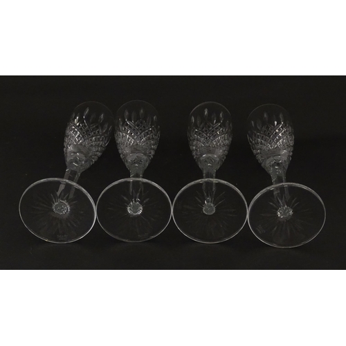 227 - A set of 8 Stuart crystal champagne flutes. Approx. 8 1/4