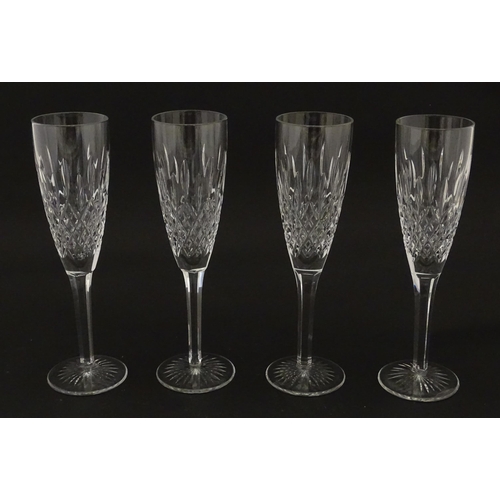 227 - A set of 8 Stuart crystal champagne flutes. Approx. 8 1/4