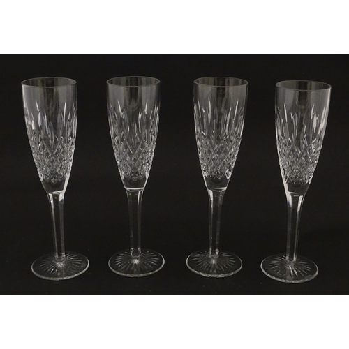 227 - A set of 8 Stuart crystal champagne flutes. Approx. 8 1/4