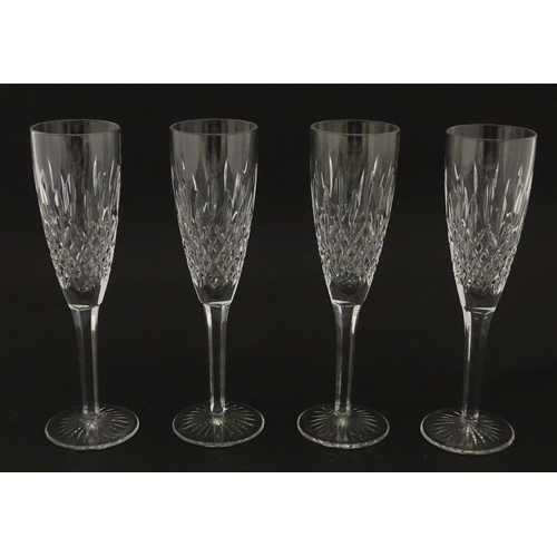 227 - A set of 8 Stuart crystal champagne flutes. Approx. 8 1/4