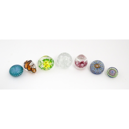 230 - A quantity of glass paperweights to include examples by Murano, Caithness, Selkirk, etc. Largest app... 