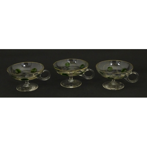 251 - WITHDRAWN FROM AUCTION - A set of six pedestal glasses with champagne coupe style bowls and green de... 