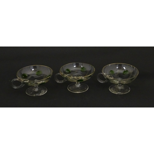 251 - WITHDRAWN FROM AUCTION - A set of six pedestal glasses with champagne coupe style bowls and green de... 