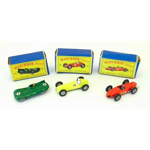 856 - Toys: Three Lesney Matchbox Series die cast scale model racing cars comprising a green D Type Jaguar... 