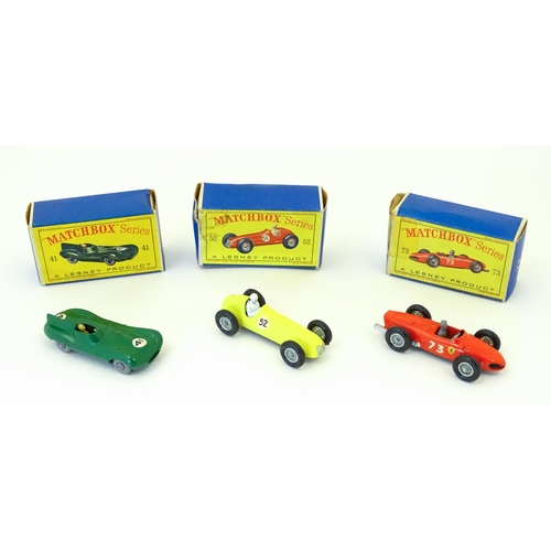 856 - Toys: Three Lesney Matchbox Series die cast scale model racing cars comprising a green D Type Jaguar... 