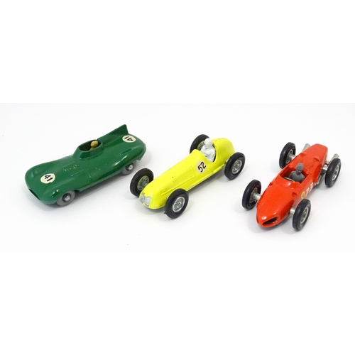 856 - Toys: Three Lesney Matchbox Series die cast scale model racing cars comprising a green D Type Jaguar... 