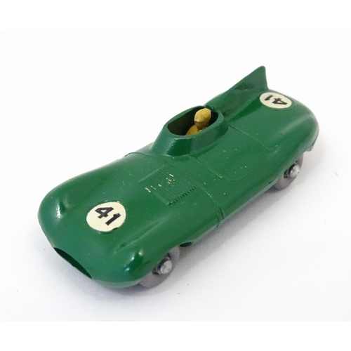 856 - Toys: Three Lesney Matchbox Series die cast scale model racing cars comprising a green D Type Jaguar... 