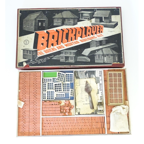 869 - Toys: A vintage modelling kit / game Brickplayer the bricks and mortar building kit (Kit 2), boxed.