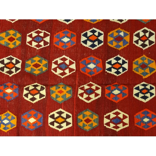 1364 - Carpet / Rug : A  South West Persian qashgai Kilim, the red ground decorated with repeating geometri... 