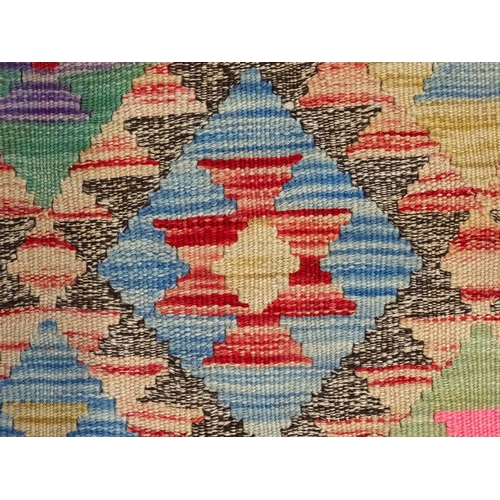 1373 - Carpet / Rug : A Turkish Anatolian Kilim decorated with repeating geometric motifs and banded border... 