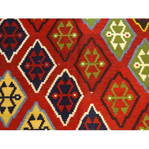 1375 - Carpet / Rug : A Turkish Anatolian Kilim decorated with repeating geometric motifs and banded border... 