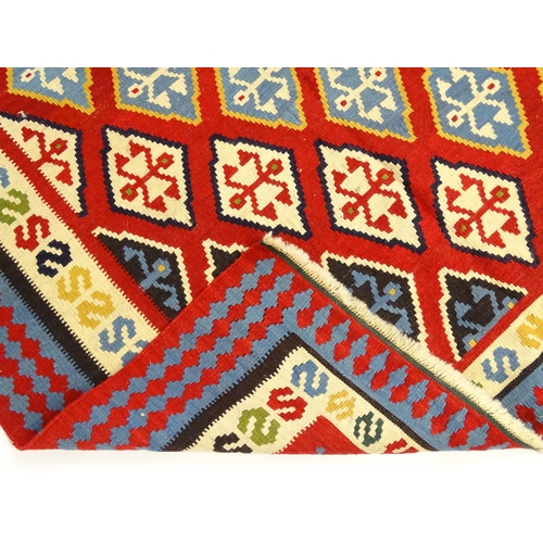 1375 - Carpet / Rug : A Turkish Anatolian Kilim decorated with repeating geometric motifs and banded border... 