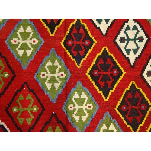 1375 - Carpet / Rug : A Turkish Anatolian Kilim decorated with repeating geometric motifs and banded border... 