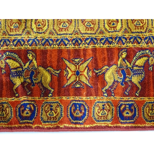 1377 - Carpet / Rug : A Russian rug decorated with horseman in procession and chequerboard geometric centre... 