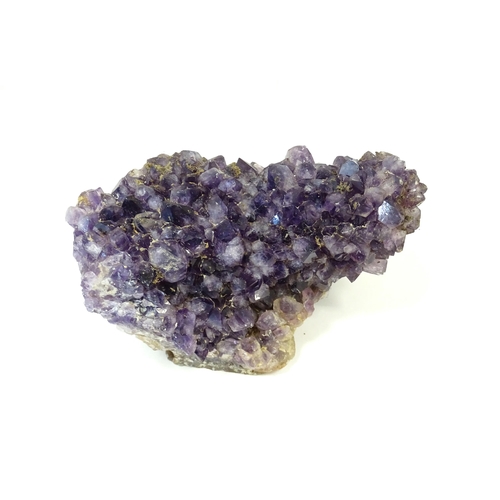 1071 - Natural History / Geology Interest: An amethyst crystal geode. Approx. 5 1/2