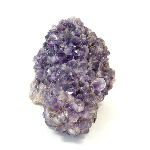 1071 - Natural History / Geology Interest: An amethyst crystal geode. Approx. 5 1/2