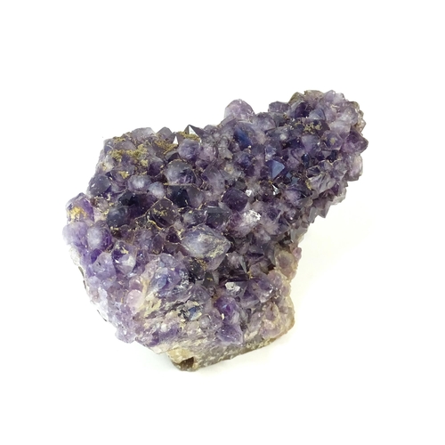 1071 - Natural History / Geology Interest: An amethyst crystal geode. Approx. 5 1/2