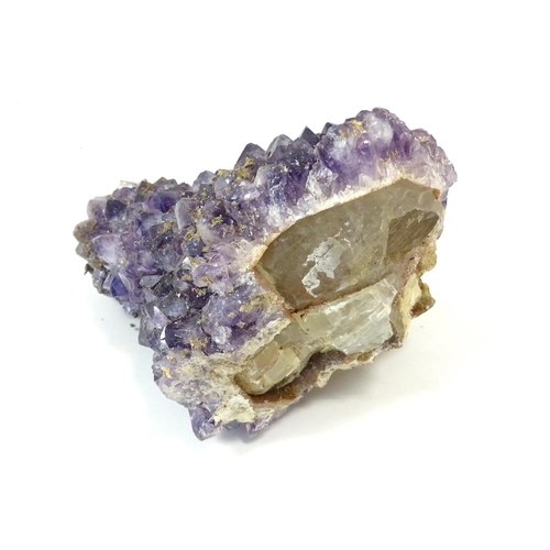 1071 - Natural History / Geology Interest: An amethyst crystal geode. Approx. 5 1/2