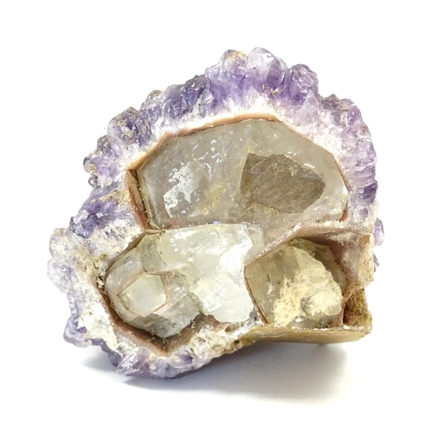 1071 - Natural History / Geology Interest: An amethyst crystal geode. Approx. 5 1/2