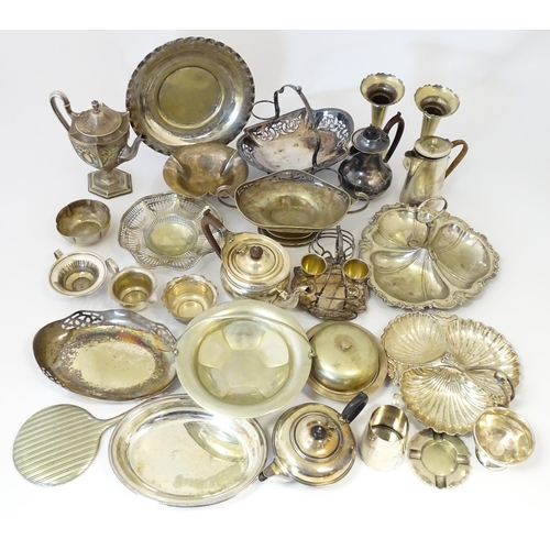 576 - A large quantity of silver plate items to include entree dishes, teapots, cake baskets, hand mirror,... 