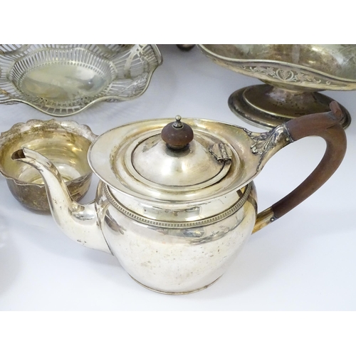 576 - A large quantity of silver plate items to include entree dishes, teapots, cake baskets, hand mirror,... 