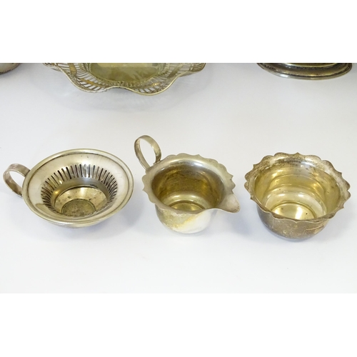 576 - A large quantity of silver plate items to include entree dishes, teapots, cake baskets, hand mirror,... 