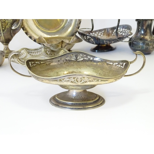 576 - A large quantity of silver plate items to include entree dishes, teapots, cake baskets, hand mirror,... 