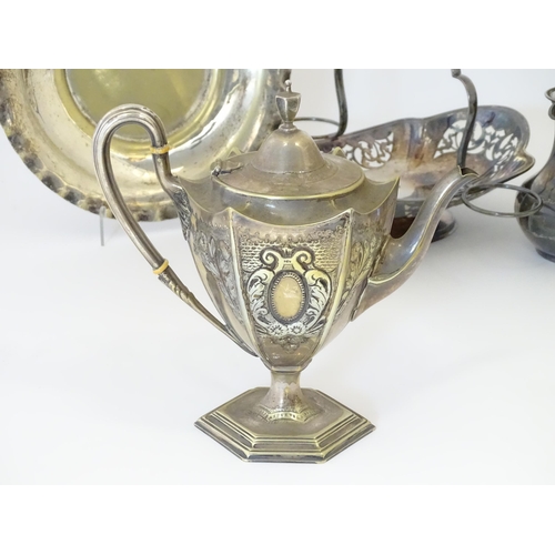 576 - A large quantity of silver plate items to include entree dishes, teapots, cake baskets, hand mirror,... 