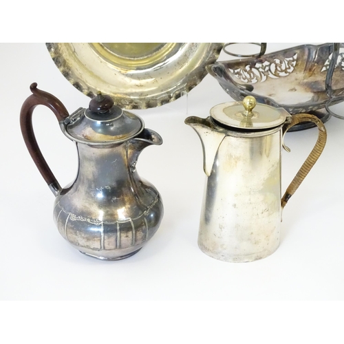 576 - A large quantity of silver plate items to include entree dishes, teapots, cake baskets, hand mirror,... 