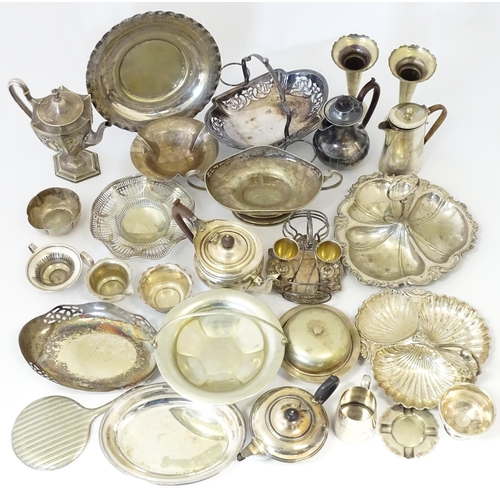 576 - A large quantity of silver plate items to include entree dishes, teapots, cake baskets, hand mirror,... 