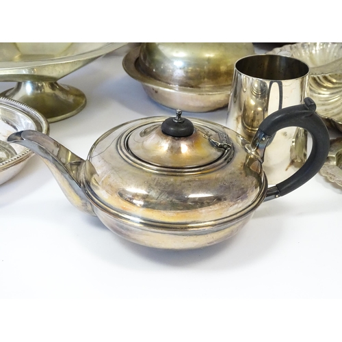 576 - A large quantity of silver plate items to include entree dishes, teapots, cake baskets, hand mirror,... 