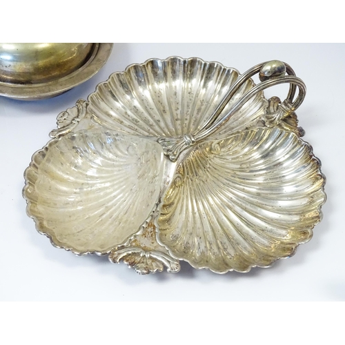 576 - A large quantity of silver plate items to include entree dishes, teapots, cake baskets, hand mirror,... 