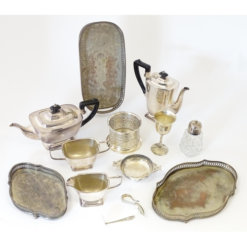 577 - A quantity of silver plated wares to include trays, tea set, bottle coaster, etc.