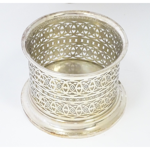 577 - A quantity of silver plated wares to include trays, tea set, bottle coaster, etc.