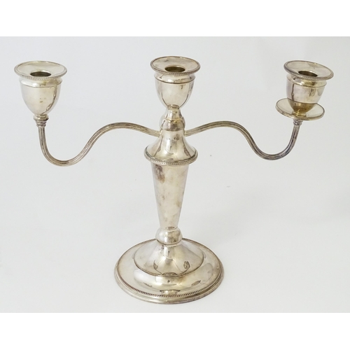 579 - A quantity of silver plated items to include candelabra, entree dishes, coffee pot, candlestick, cru... 