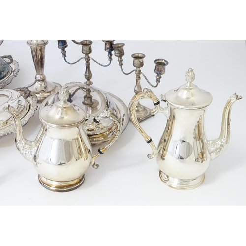 579 - A quantity of silver plated items to include candelabra, entree dishes, coffee pot, candlestick, cru... 