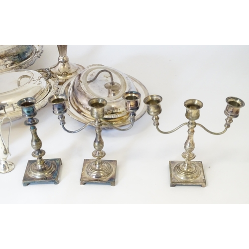 579 - A quantity of silver plated items to include candelabra, entree dishes, coffee pot, candlestick, cru... 