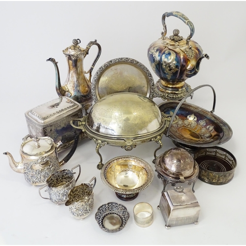 580 - A quantity of 19thC and later silver plated wares to include tea set, spirit kettle, serving dishes,... 